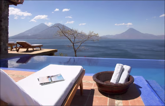 Guatemala's Lake Atitlan is distinguished by the three volcanoes that line its southern shore. The Hotel Casa Palopo incorporates the Mayan influence into its design scheme, bringing the local culture right into the hotel.